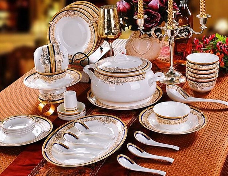 Fine gold-rimmed porcelain dinner set from Angamia's